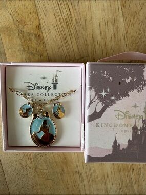 Disney Gold-Tone Necklace with Light Blue Enamel Princess Pendants